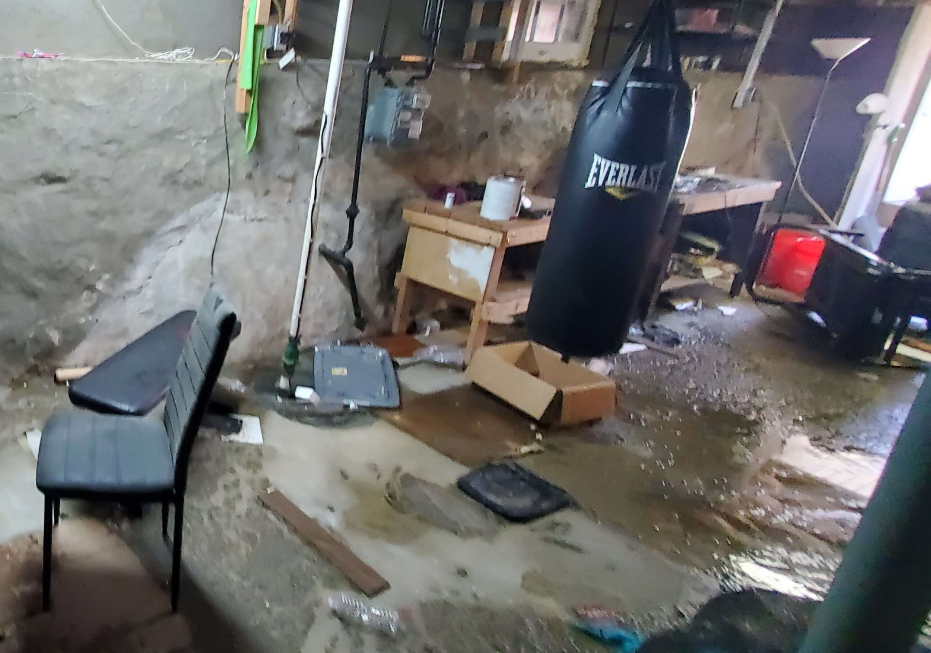 Flooded basement before water damage cleanup